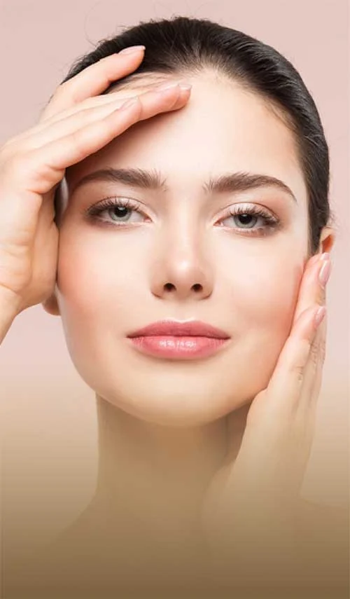 Young woman with glowing skin after a facial